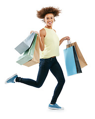 Image showing Shopping bag, running and black woman in studio portrait for retail sale, advertising or marketing fashion product. Shopping, fast and discount date with excited customer isolated on white background