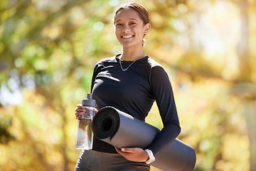 Image showing Portrait, exercise and woman with water bottle, fitness and workout for wellness, health and in park. Latino female girl and athlete with yoga mat, hydration and training for cardio, energy or sports