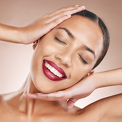 Image showing Face, beauty and woman with lipstick, hands frame and cosmetic care for lips, makeup against studio background. Teeth, dental and skincare wellness with cosmetics product, smile and microblading