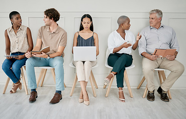 Image showing Hiring, recruitment or people in a waiting room for a marketing job interview at a office building. Human resources, men and business women with career goals wait as a group for company hr manager