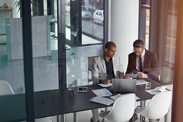 Image showing Business people, talking and planning online for corporate strategy or partnership with teamwork. Men together in a meeting discussion with documents, paperwork and laptop at management table