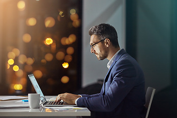 Image showing Night, corporate and man typing, focus and digital marketing for website launch, connection and workplace. Male employee, leader and entrepreneur working late, online reading or thinking for business