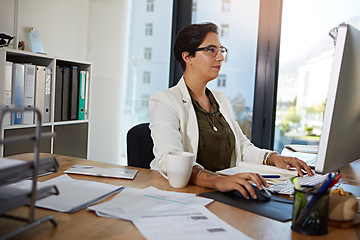 Image showing Computer, working and business woman in office typing online documents, website research and writing email. Corporate networking, and busy female employee at desk with focus, planning and ideas