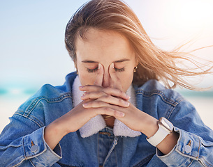 Image showing Woman, beach and stress headache for anxiety, depression or mental health pain. Young tired girl, thinking burnout and depressed head pain, overwhelmed fear or frustrated migrain by ocean sea outdoor