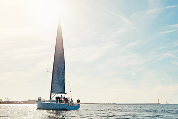 Image showing Sea, yacht and sailing on the ocean on vacation by summer sunshine on water. Lens flare, holiday adventure and boat cruise travel of people in the sun and blue sky in nature to relax with mockup