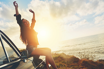 Image showing Road trip, freedom and woman sunset on beach for travel, journey and summer holiday celebration. Celebrate, girl portrait on vintage, retro car for outdoor vacation, parking and nature drive by ocean