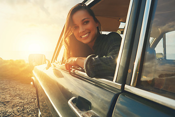 Image showing Portrait, travel and road trip with a black woman in a car at sunset during summer vacation or holiday. Nature, window and drive with an attractive young female sitting in transport for adventure
