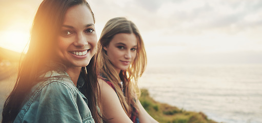 Image showing Friends at sunset, women at the beach with travel and adventure portrait, outdoor with nature and sea holiday. Road trip mockup, freedom and gen z youth on summer vacation, happiness with lens flare