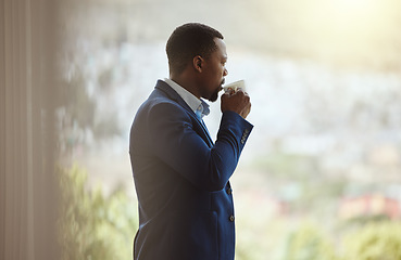 Image showing Thinking businessman, travel or drinking coffee by window in airport lounge, hotel lobby or modern office building. Corporate worker, employee or manager with tea, innovation vision or company ideas