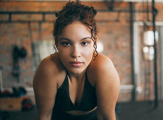 Image showing Fitness, exercise and portrait of a woman at gym for a workout and training for healthy lifestyle and body wellness. Face of sports female or athlete at health club for balance, energy and power