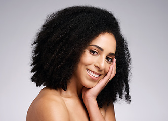 Image showing Beauty, skincare and product with portrait of black woman for facial, self care and luxury cosmetics. Spa, hair care and makeup with face of girl model for treatment, natural and wellness in studio