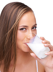 Image showing Portrait, milk drink and happy woman in studio, isolated white background or healthy diet. Face of female model, glass and fresh dairy for breakfast, protein and calcium, organic wellness or vitamins