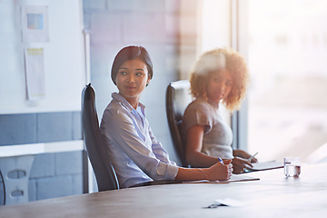 Image showing Business people, women and office at desk for meeting, innovation or planning for marketing strategy. Black woman, focus and business meeting for goal in modern office, teamwork or company vision