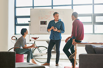 Image showing Presentation, coaching and business man startup on whiteboard strategy, planning and workshop. Teamwork, business growth and mentor, manager or boss speaking to employees of mission, ideas or goals