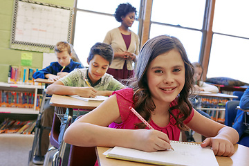 Image showing Learning, happy and girl portrait in classroom with notebook for lesson notes and knowledge. School kids, education and development of middle school children writing in books with focus.