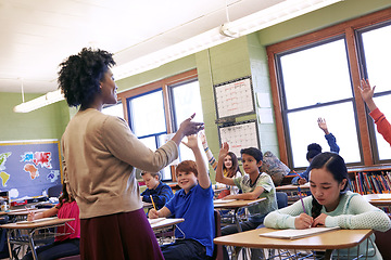 Image showing Teacher, students and classroom with hands for question, answer or FAQ of engaging children. Happy female educator teaching enthusiastic kids for learning, education or development in class