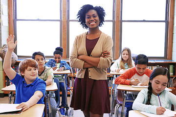 Image showing Learning portrait, black woman and student with question in classroom or school. Education, arms crossed and scholarship boy raising hand to answer questions, studying or help with happy teacher.