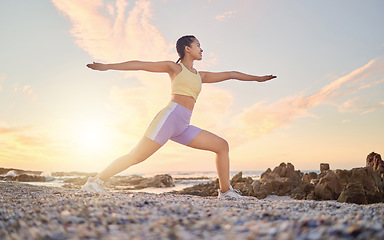 Image showing Beach, yoga or woman stretching in fitness training, body workout or exercise for natural balance in Miami, Florida. Mindfulness, breathing or healthy zen girl exercising at sunset with calm peace