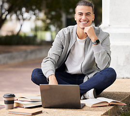 Image showing Education, laptop and student studying at college, online learning and exam preparation in Canada. School, scholarship and portrait of a man reading for research on a computer at university campus