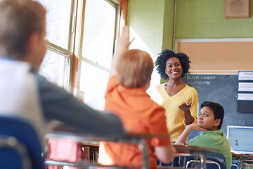 Image showing Question, teacher and children in classroom with hand in academy lesson, learning and studying. Knowledge, teaching and students, school kids and learner with arm up for asking, ideas and answer