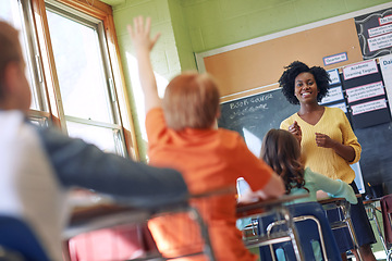 Image showing Education, teacher and children in classroom with question in academy lesson, learning and studying. Knowledge, teaching and students, school kids and learner with arm up for asking, ideas and answer