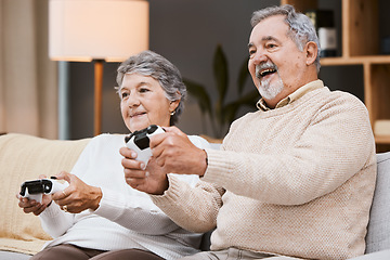 Image showing Video game, sofa and senior couple with gaming online in home for happy holiday, retirement and lifestyle together with technology. Excited, elderly and gamer people on couch on games in living room