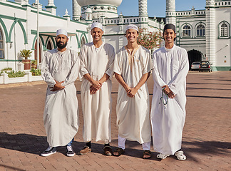 Image showing Happy, hajj and Muslim men at a mosque to pray, ramadan faith and group in Mekka together. Smile, religion and portrait of Islamic friends on a pilgrimage to the holy city for spiritual journey