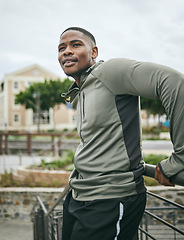 Image showing Fitness, relax or tired black man on a break in running training, exercise or workout in city of Miami, Florida. Resting, runner or healthy sports athlete thinking of body goals, motivation or vision