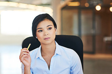 Image showing Idea, planning and vision with a business asian woman in her office thinking about the future of her company. Mission, mindset and growth with a female employee holding a pencil while sitting at work