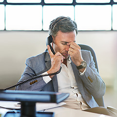 Image showing Elderly businessman, headache and telephone call in office for online communicaton and tired employee. Frustrated man, head pain and deadline stress or employee anxiety for corporate phone call