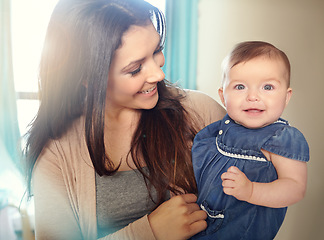 Image showing Mother, bonding or baby girl portrait in house living room or family home bedroom in support trust, security or love carrying. Smile, infant or happy mom holding child in comfort for profile picture