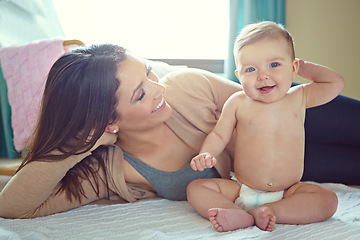 Image showing Mom, baby girl or bonding in bedroom of house or family home in support trust, love and security in diapers. Smile, child or happy mother in infant healthcare wellness, changing clothes or after bath