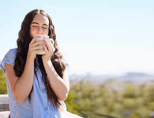 Image showing Woman, coffee and relax outdoor for calm freedom, peace travel vacation or summer holiday in nature with closed eyes. Sunshine, drinking tea and young girl relaxing, thinking and breathing fresh air