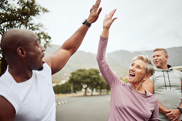 Image showing Fitness, high five and diversity friends or people with support, accountability and teamwork in nature training, exercise or workout. Wellness, community and senior with target, success or goal sign