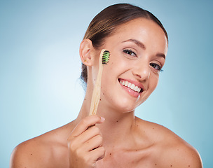 Image showing Brushing teeth, dental and woman with toothbrush for teeth whitening and beauty, oral health and fresh breath with studio background. Mouth wellness, Invisalign portrait and clean with bamboo brush.