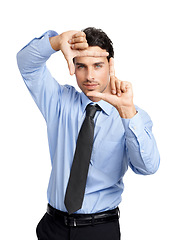 Image showing Portrait, businessman and finger frame on studio background for profile picture. Young worker, hand sign and framing face for corporate perspective, professional update and vision, planning and focus