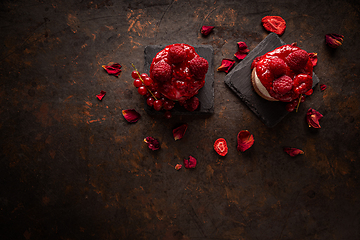 Image showing Berries cheescake with red icing