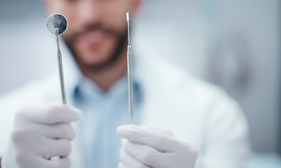 Image showing Hands, dentist mouth mirror and excavator for healthcare wellness checkup, teeth surgery or annual dental maintenance. Zoom, man and orthodontist with metal tools for teeth cleaning or hygiene help