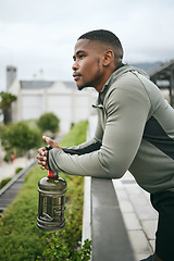 Image showing Fitness, thinking or black man at a park to relax in nature after training, exercise or outdoor workout. Wellness, mindset or healthy African sports athlete with body goals, vision or motivation