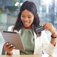 Image showing Black woman, credit card and online shopping on tablet in office. Ecommerce, technology and happy female entrepreneur with touchscreen and debit card for online banking, product payment or investment