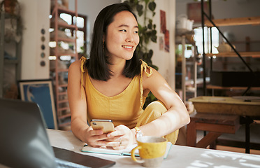 Image showing Startup, Asian or business woman with phone for networking, online communication or blog content search. Happy, smile or girl with notebook and smartphone for social media, planning or website review