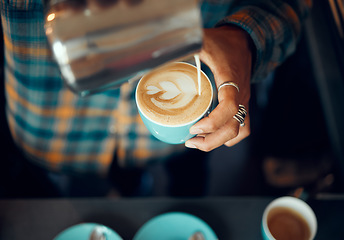 Image showing Coffee, milk and hands of man in cafe for cappuccino, breakfast and caffeine beverage. Relax, espresso and dairy with barista in coffee shop with latte art for retail, mocha and drink preparation