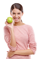 Image showing Health, apple and smile with portrait of woman for nutrition, diet and weight loss choice. Fiber, food and vitamins with isolated face of girl eating fruit for wellness, organic and natural in studio