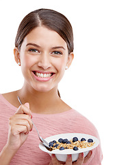 Image showing Happy, woman and smile with healthy bowl of breakfast cereal against a white studio background. Portrait of isolated young female model smiling holding muesli for food health, nutrition or fiber