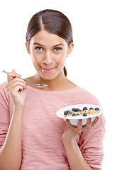 Image showing Happy, woman and healthy breakfast bowl of cereal for eating against white studio background. Portrait of isolated young female model smiling holding muesli with fruit for health, nutrition or fiber