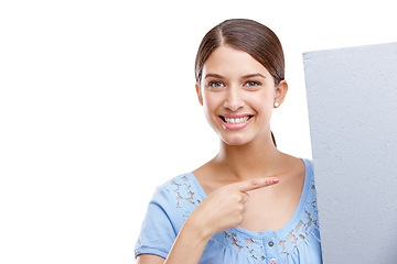 Image showing Portrait, point and poster with a woman in studio isolated on a white background holding a blank sign for branding. Logo, marketing and brand with a female showing mockup space for advertising