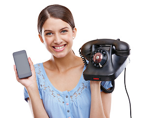 Image showing Woman, mobile phone and retro telephone, communication technology and contact isolated on white background. Portrait, smile and marketing modern with vintage, tech and upgrade with phone in hands