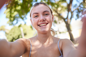 Image showing Selfie, park and portrait of woman in summer enjoying holiday, vacation and weekend in nature. Freedom, happy lifestyle and face of girl taking photo outdoors for relaxing, adventure and carefree day