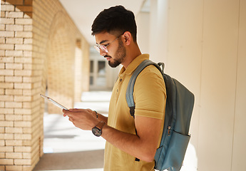 Image showing University, tablet and campus student typing internet, web or website search for college, digital research or study project. Education profile, school learning and man review online knowledge report