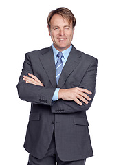 Image showing Businessman, studio portrait and suit with arms crossed, smile or leadership success by white background. Happy corporate leader, focus and isolated for executive goal, mission or professional vision